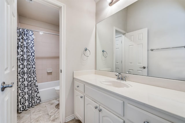 full bath featuring shower / tub combo, toilet, and vanity