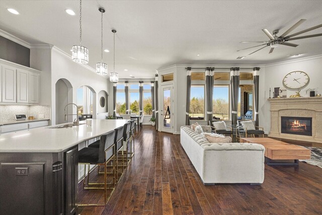1904 Kings Pass, Heath, TX 75032 - home office with visible vents, baseboards, ornamental molding, and dark wood-style floors