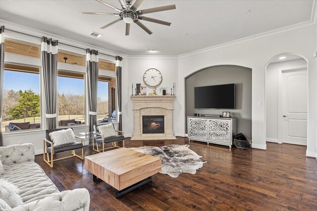 1904 Kings Pass, Heath, TX 75032 - living room with a ceiling fan, dark wood-style flooring, a glass covered fireplace, ornamental molding, and recessed lighting