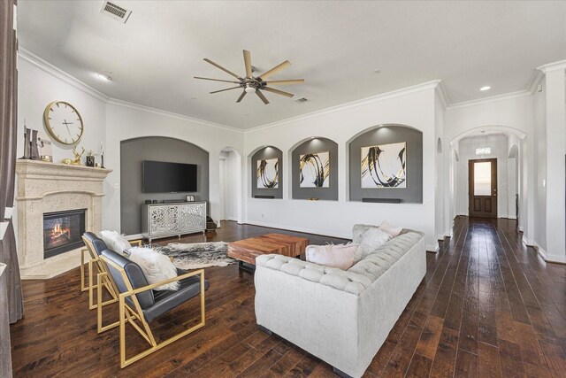 1904 Kings Pass, Heath, TX 75032 - living room with arched walkways, a premium fireplace, recessed lighting, and a ceiling fan