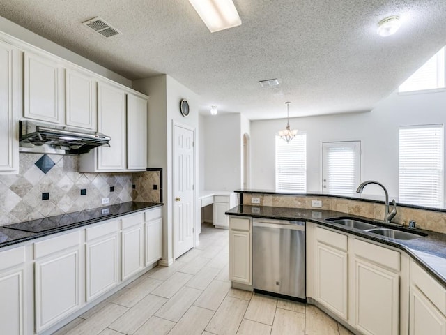 8317 Spring Valley Ln, Plano, TX 75025 - kitchen with visible vents, black electric stovetop, under cabinet range hood, dishwasher, and a sink