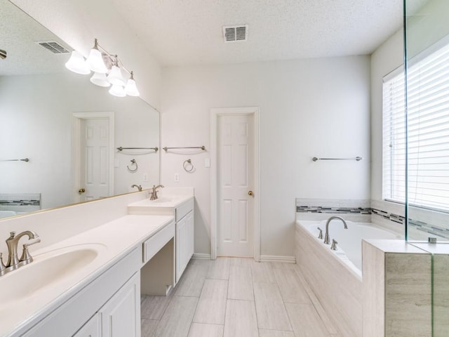 8317 Spring Valley Ln, Plano, TX 75025 - full bath with a healthy amount of sunlight, visible vents, and a sink