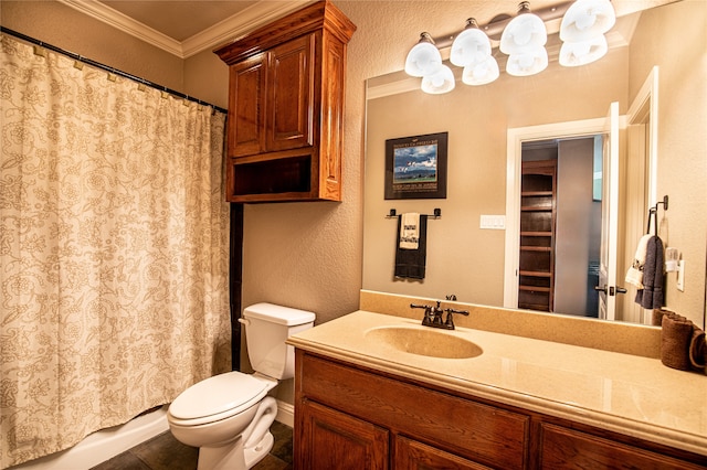 bathroom with ornamental molding, toilet, a textured wall, vanity, and a shower with curtain