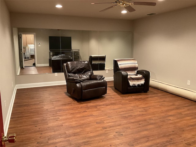 sitting room featuring recessed lighting, ceiling fan, wood finished floors, and baseboards
