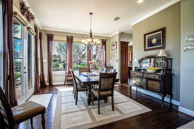 dining area featuring baseboards, a chandelier, dark wood-style flooring, crown molding, and recessed lighting