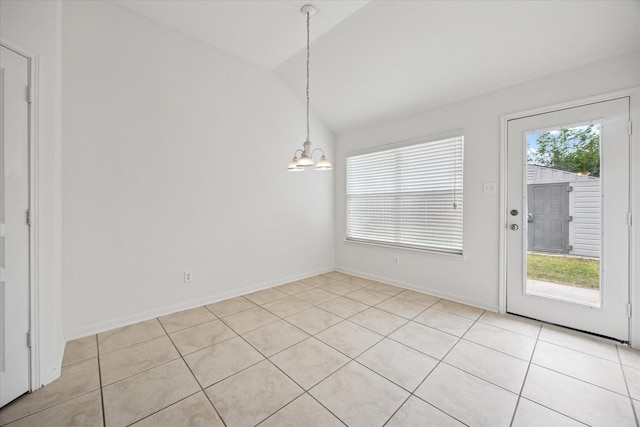 11709 Netleaf Ln, Fort Worth, TX 76244 - unfurnished dining area featuring light tile patterned flooring, a notable chandelier, lofted ceiling, and baseboards