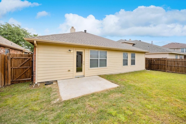 11709 Netleaf Ln, Fort Worth, TX 76244 - rear view of property with a chimney, a fenced backyard, a yard, and a patio area