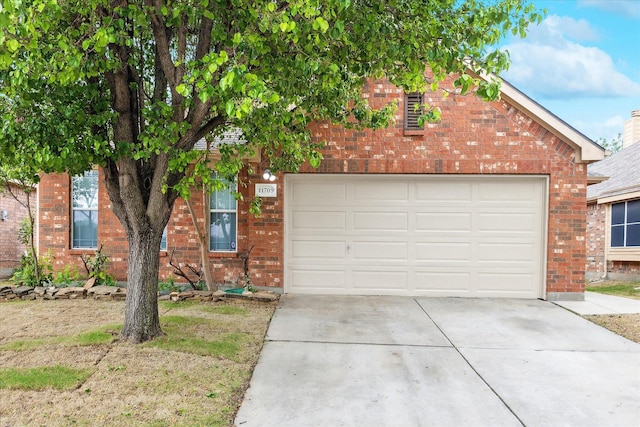 11709 Netleaf Ln, Fort Worth, TX 76244 - view of front of home featuring driveway and brick siding