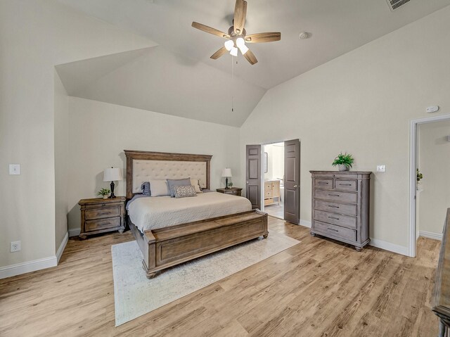 bedroom with ceiling fan, light wood finished floors, baseboards, visible vents, and high vaulted ceiling