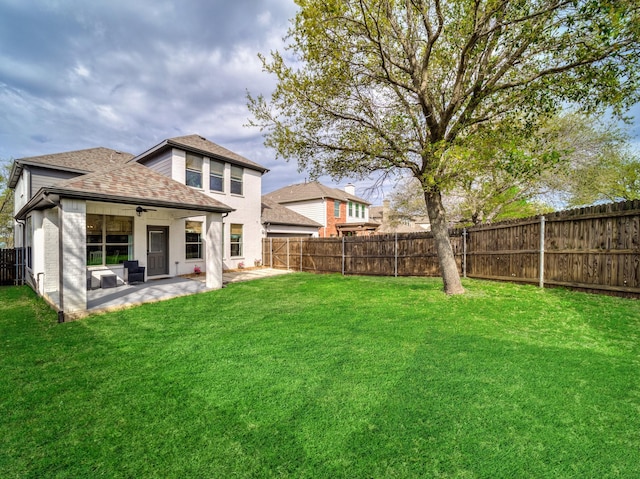 1381 Coastal Dr, Rockwall, TX 75087 - rear view of house with roof with shingles, a patio, and a ceiling fan
