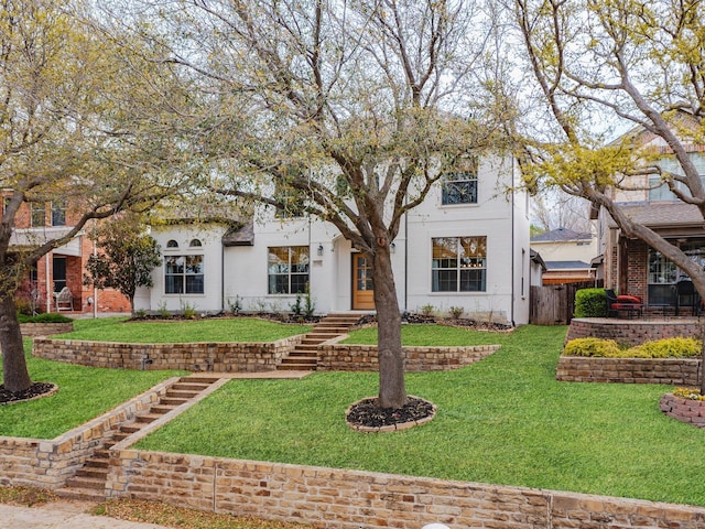 1381 Coastal Dr, Rockwall, TX 75087 - view of front of home with stucco siding and stairs