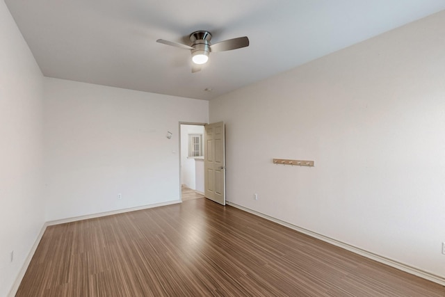 1312 Cattle Crossing Dr, Fort Worth, TX 76131 - spare room with a ceiling fan, wood finished floors, and baseboards