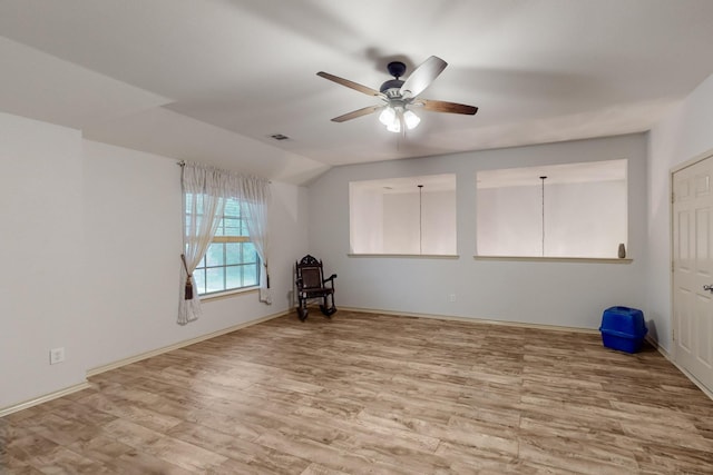 1312 Cattle Crossing Dr, Fort Worth, TX 76131 - empty room with ceiling fan, wood finished floors, baseboards, and lofted ceiling