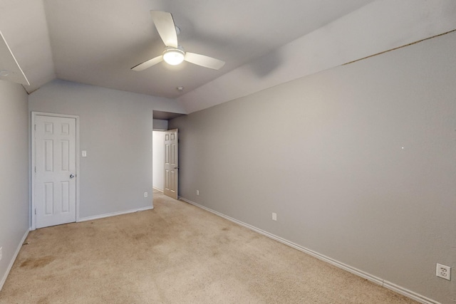 1312 Cattle Crossing Dr, Fort Worth, TX 76131 - unfurnished bedroom with light colored carpet, baseboards, lofted ceiling, and a ceiling fan