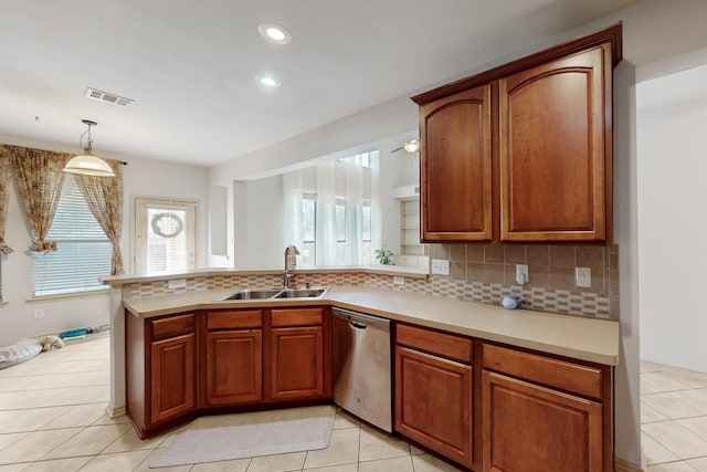 1312 Cattle Crossing Dr, Fort Worth, TX 76131 - kitchen featuring stainless steel dishwasher, a sink, backsplash, a peninsula, and recessed lighting