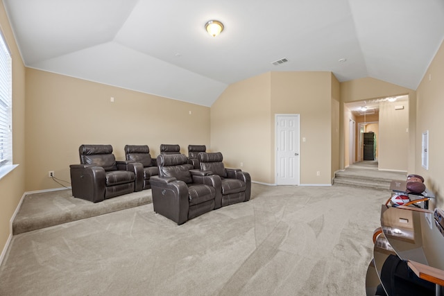 1192 Oak Hill Ln, Murphy, TX 75094 - cinema featuring light carpet, lofted ceiling, and baseboards