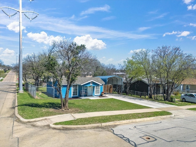 5536 Goodman Ave, Fort Worth, TX 76107 - view of property hidden behind natural elements featuring a detached carport and driveway