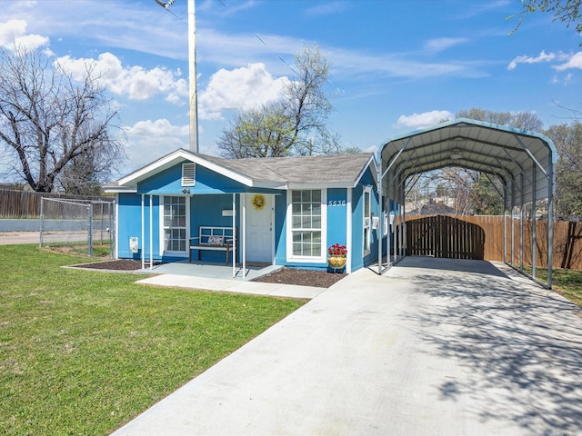 5536 Goodman Ave, Fort Worth, TX 76107 - view of front of house featuring a gate, a detached carport, covered porch, and concrete driveway