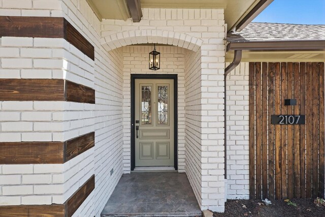 2107 Emerald Lake Dr, Arlington, TX 76013 - entrance to property with brick siding and a shingled roof