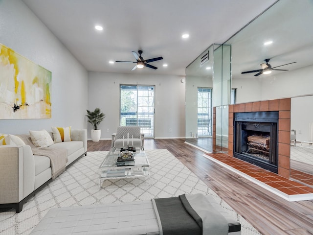 12480 Abrams Rd Unit 3023, Dallas, TX 75243 - living area featuring a chandelier, recessed lighting, a ceiling fan, baseboards, and wood finished floors