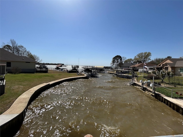 view of water feature with a boat dock
