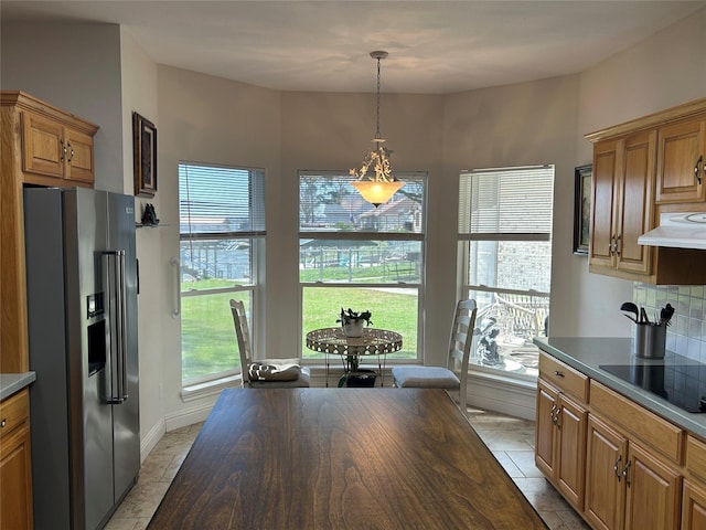 dining area featuring plenty of natural light