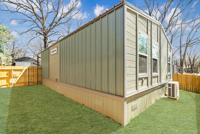 view of outbuilding with a fenced backyard