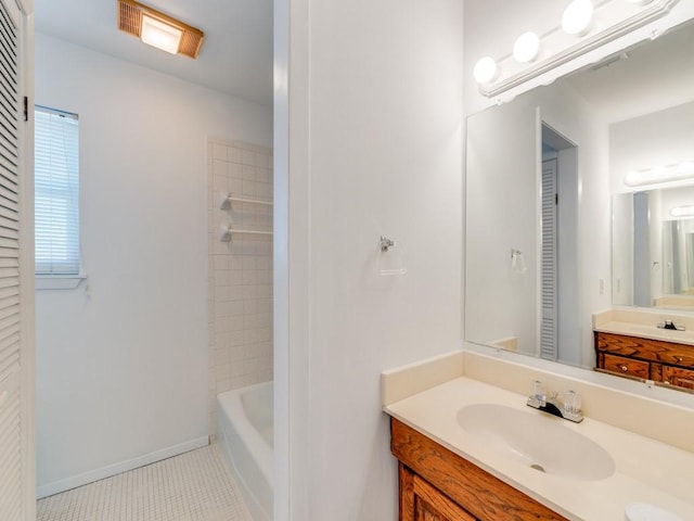 full bathroom featuring tile patterned floors, baseboards, visible vents, and a closet