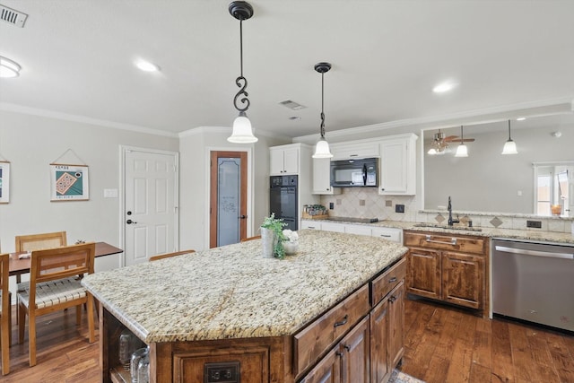 7732 Sagebrush Ct N, North Richland Hills, TX 76182 - kitchen featuring black appliances, a sink, crown molding, dark wood-type flooring, and white cabinetry