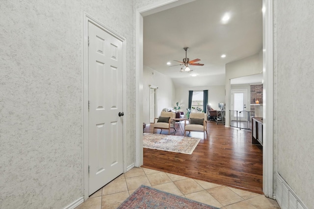 7732 Sagebrush Ct N, North Richland Hills, TX 76182 - living area featuring light tile patterned floors, ceiling fan, and recessed lighting