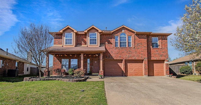 view of front of property featuring central AC unit, an attached garage, concrete driveway, a front yard, and brick siding