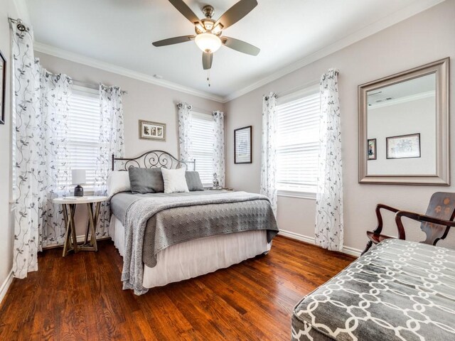 1410 Corto Dr, Dallas, TX 75218 - bedroom featuring wood finished floors, crown molding, baseboards, and a ceiling fan