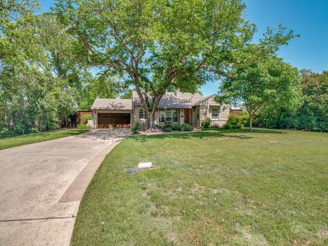 1410 Corto Dr, Dallas, TX 75218 - view of front facade with a garage, a front yard, and driveway