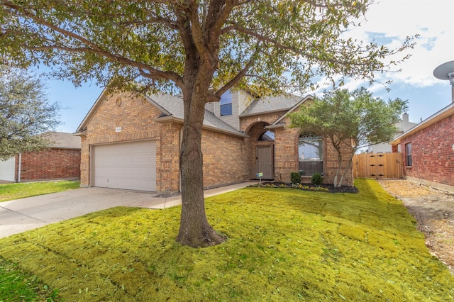 1209 Kachina Ln, Fort Worth, TX 76052 - traditional-style home featuring roof with shingles, brick siding, an attached garage, driveway, and a gate