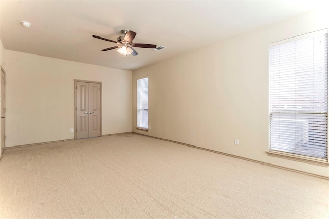 1209 Kachina Ln, Fort Worth, TX 76052 - unfurnished room with ceiling fan, plenty of natural light, light carpet, and baseboards