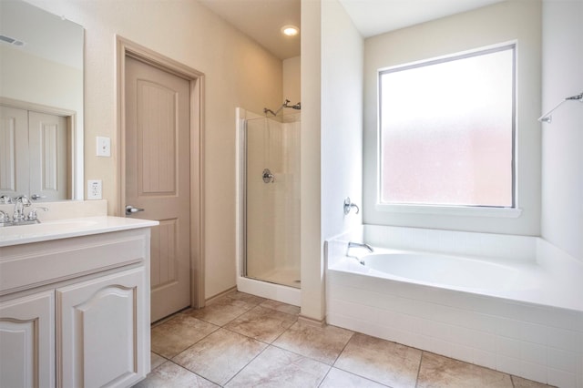 1209 Kachina Ln, Fort Worth, TX 76052 - full bath featuring vanity, a bath, and a shower stall