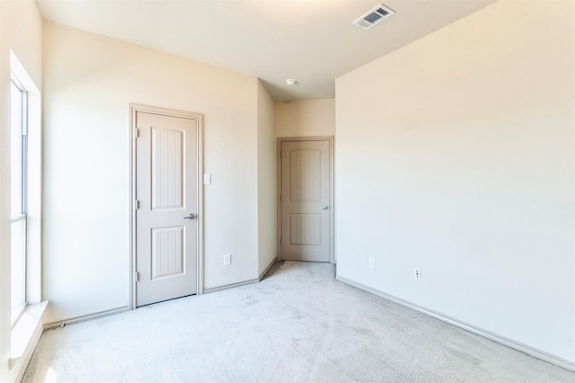 1209 Kachina Ln, Fort Worth, TX 76052 - unfurnished bedroom featuring light carpet and baseboards