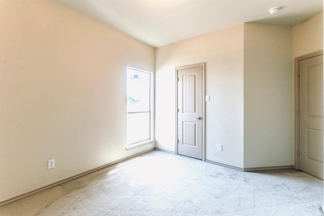 1209 Kachina Ln, Fort Worth, TX 76052 - unfurnished bedroom with light colored carpet and baseboards