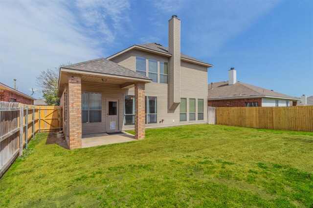 1209 Kachina Ln, Fort Worth, TX 76052 - back of house with a patio and roof with shingles