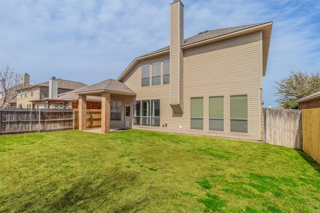 1209 Kachina Ln, Fort Worth, TX 76052 - rear view of house featuring a chimney and a patio area