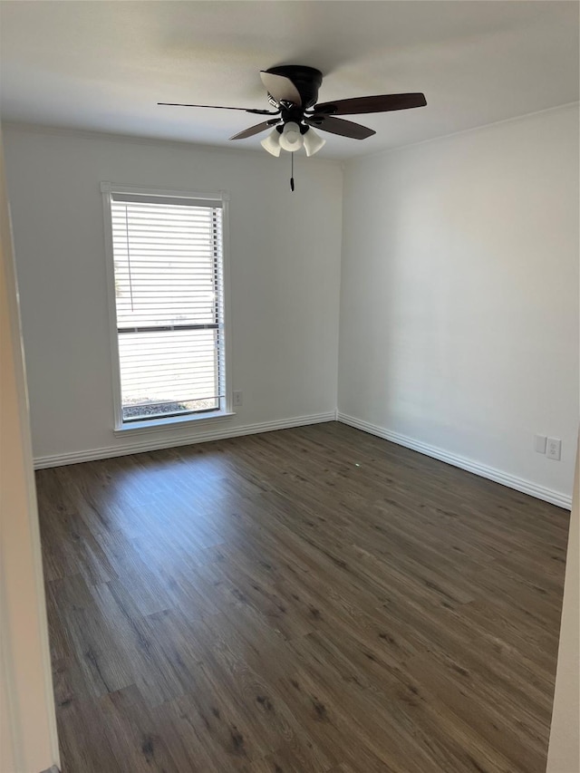 6904 Glenwood Dr, North Richland Hills, TX 76182 - spare room featuring dark wood-style flooring, baseboards, and a ceiling fan