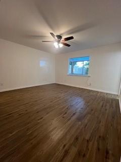 6904 Glenwood Dr, North Richland Hills, TX 76182 - empty room with dark wood-style flooring, ceiling fan, and baseboards