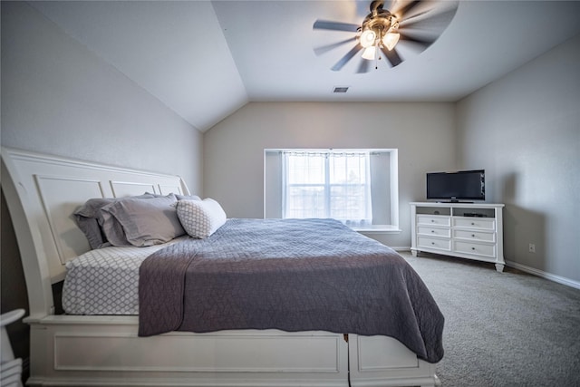 carpeted bedroom with visible vents, ceiling fan, baseboards, and lofted ceiling