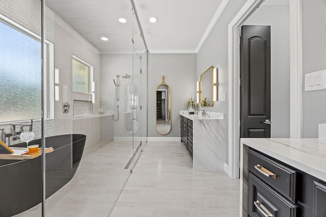 504 Shadow Wood Ln, Heath, TX 75032 - bathroom with recessed lighting, vanity, a stall shower, ornamental molding, and a soaking tub
