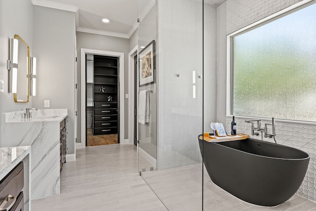 504 Shadow Wood Ln, Heath, TX 75032 - full bath featuring vanity, a soaking tub, a shower with door, crown molding, and healthy amount of natural light