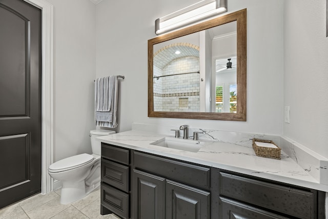 504 Shadow Wood Ln, Heath, TX 75032 - bathroom featuring vanity, a tile shower, toilet, ornamental molding, and tile patterned floors