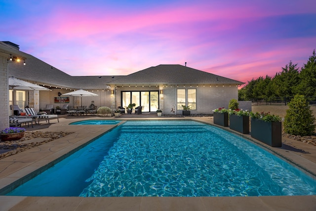 504 Shadow Wood Ln, Heath, TX 75032 - swimming pool with a patio area