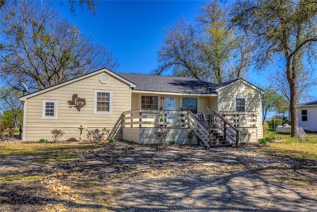 single story home featuring stairway