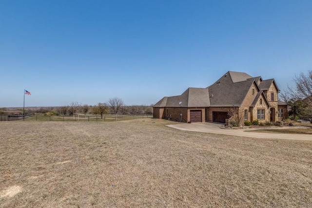 1211 Meredith Creek Ln, Fort Worth, TX 76179 - view of yard with a garage, concrete driveway, and fence