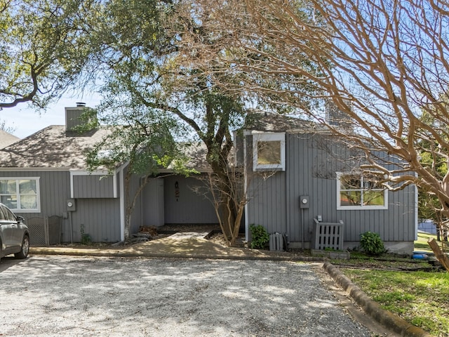 view of front of property with a chimney